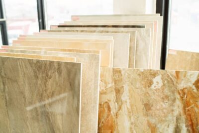 Elegant toilet providing tile and stone wall tile layout